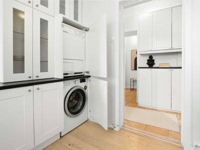 Bespoke laundry storage cabinetry from Sydney cabinet maker Infinity Interiors